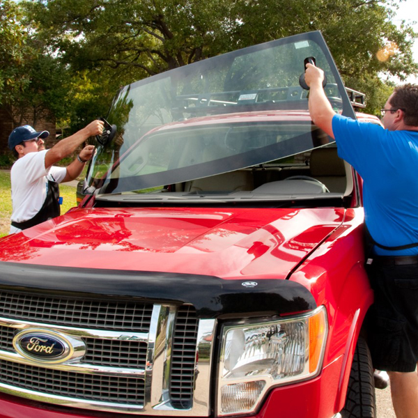 Men Performing Mobile Windshield Replacement