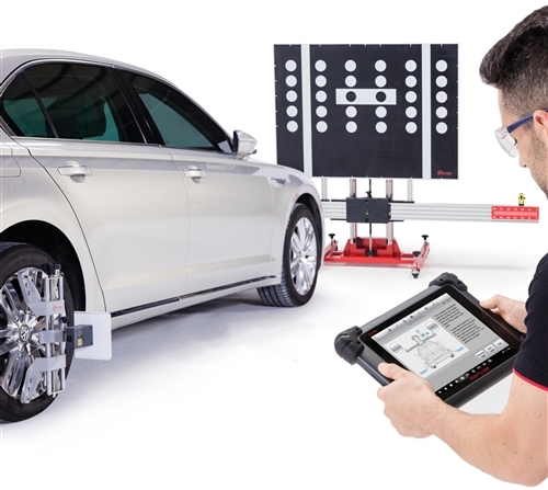 Man calibrating car ADAS system