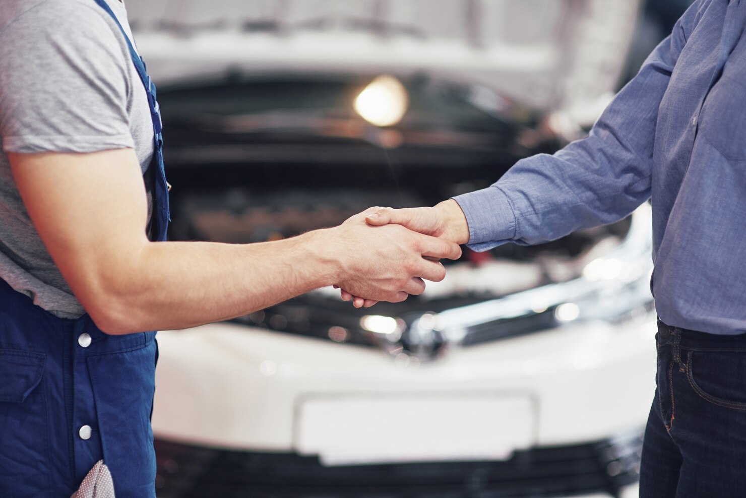 Men Shaking Hands for Auto Glass Service Deal